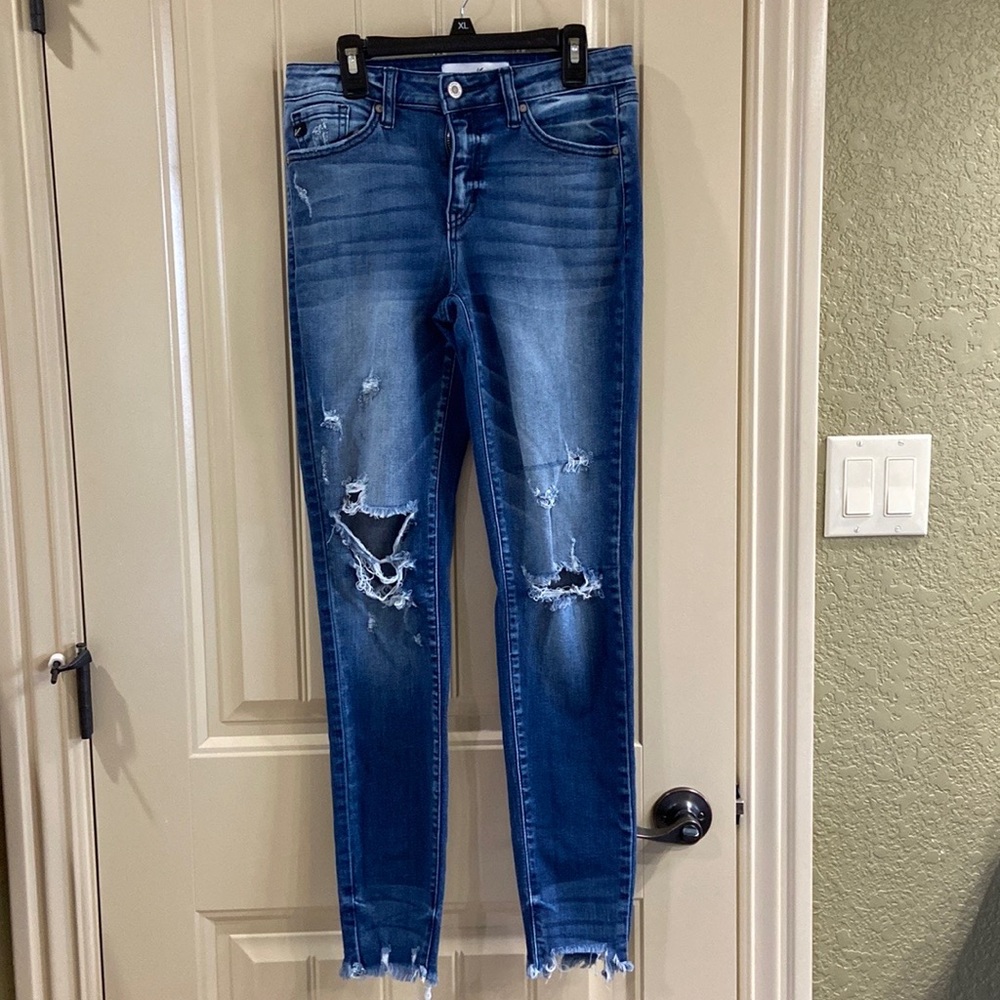 Distressed Skinny Jeans by KanCan Brand.